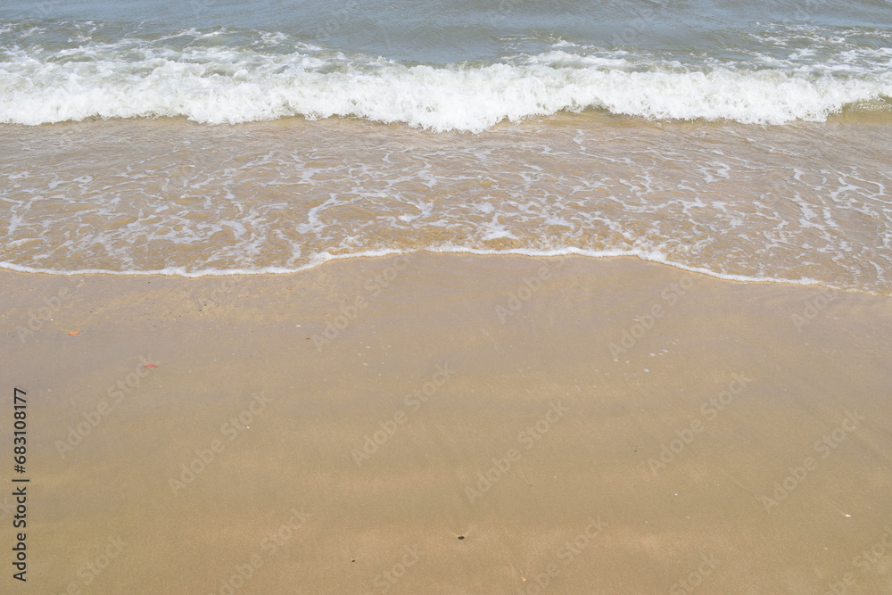 peaceful water and sand composition useful for background of sandy beach with water edge peaceful water and sand composition useful for background of sandy beach with water edge