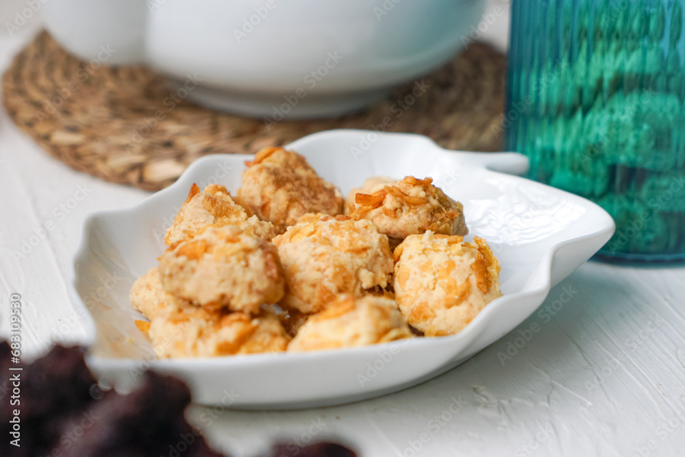 Cornflakes cookies in a white plate. Selective focus. Cornflakes cookies in a white plate. Selective focus.
