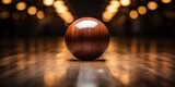 Wooden bowling ball on display in an alley.