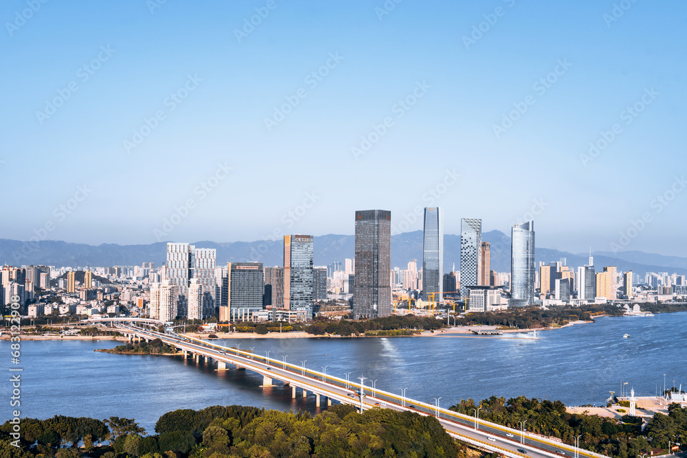 CBD city skyline scenery along the Min River in Fuzhou, Fujian, China CBD city skyline scenery along the Min River in Fuzhou, Fujian, China
