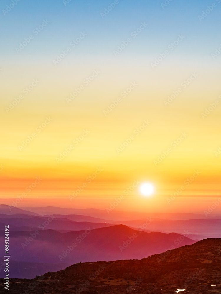 Obraz premium Burning sunset above clouds, Serra da Estrela, Portugal.