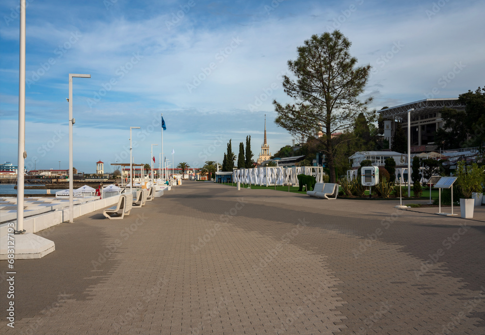 View of the promenade along the Black Sea on Primorskaya street and the Sea station of Sochi on a sunny morning, Sochi, Krasnodar Krai, Russia View of the promenade along the Black Sea on Primorskaya street and the Sea station of Sochi on a sunny morning, Sochi, Krasnodar Krai, Russia