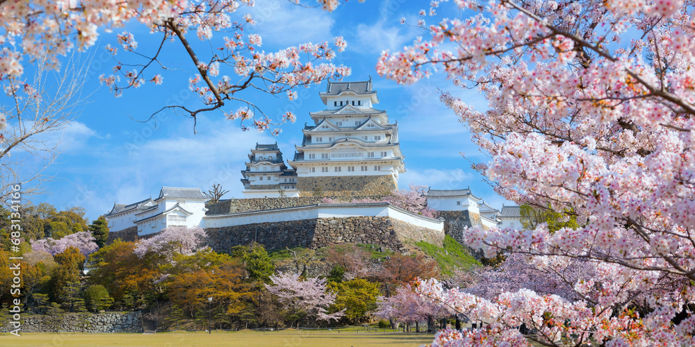 Himeji Castle AKA White Heron Castle in Hyogo, Japan with beautiful full bloom sakura in spring. Himeji Castle AKA White Heron Castle in Hyogo, Japan with beautiful full bloom sakura in spring.