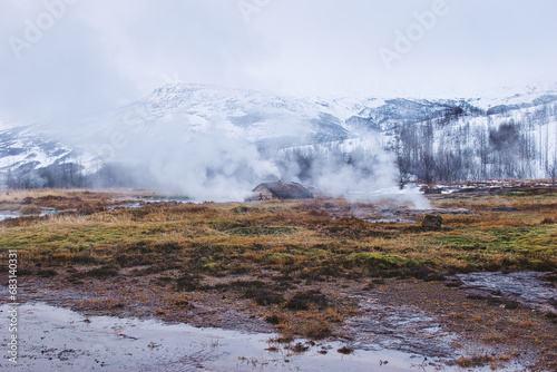 The colorful geyser landscape at the Haukadalur geothermal area, part of the golden circle route, in Iceland. November 2021.