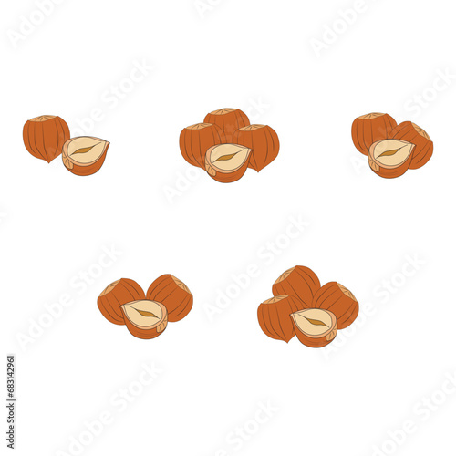 Whole and half hazelnuts isolated on white background.