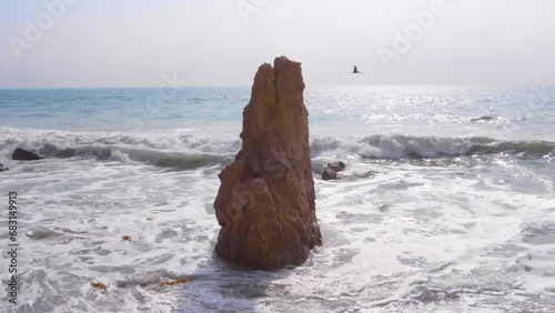 Narrow Sea Stack with seagulls at low tide on El Matador Beach, Malibu, California. Malibu_3868