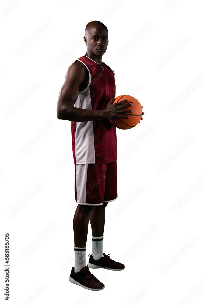 Obraz premium Digital png photo of focused african american basketball player with ball on transparent background