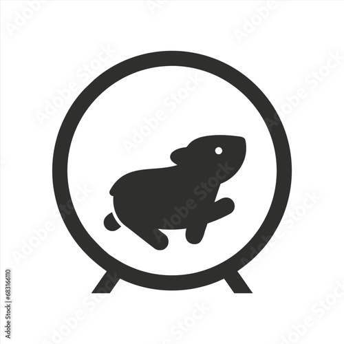 Cute pet hamster running in a hamster wheel	