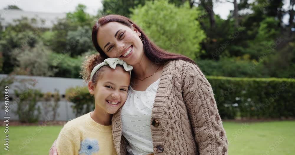 Family, love and a daughter hugging her mother in the garden of their home for summer bonding together. Portrait, smile or happy with a young woman parent embracing her girl child in the backyard