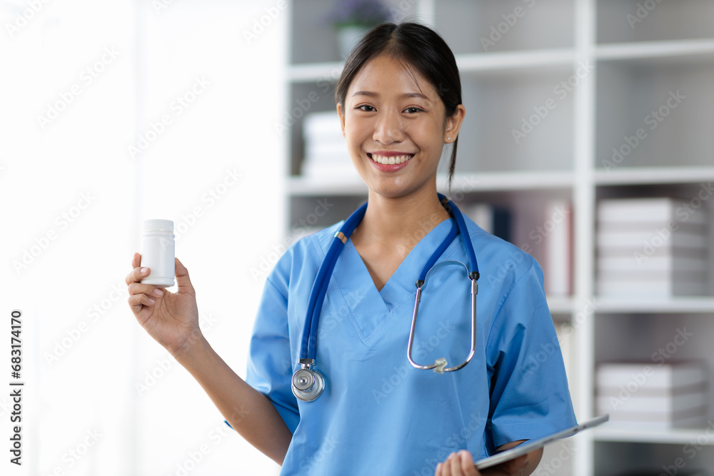 Portrait young Asian female medical student smiling. Doctor's assistant in a clinic office at a hospital. Portrait young Asian female medical student smiling. Doctor's assistant in a clinic office at a hospital.