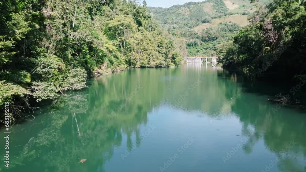 Presa de Tireo Reservoir In Loma de Blanco Bonao, Dominican Republic. Aerial Forward Shot
Presa de Tireo Reservoir In Loma de Blanco Bonao, Dominican Republic. Aerial Forward Shot