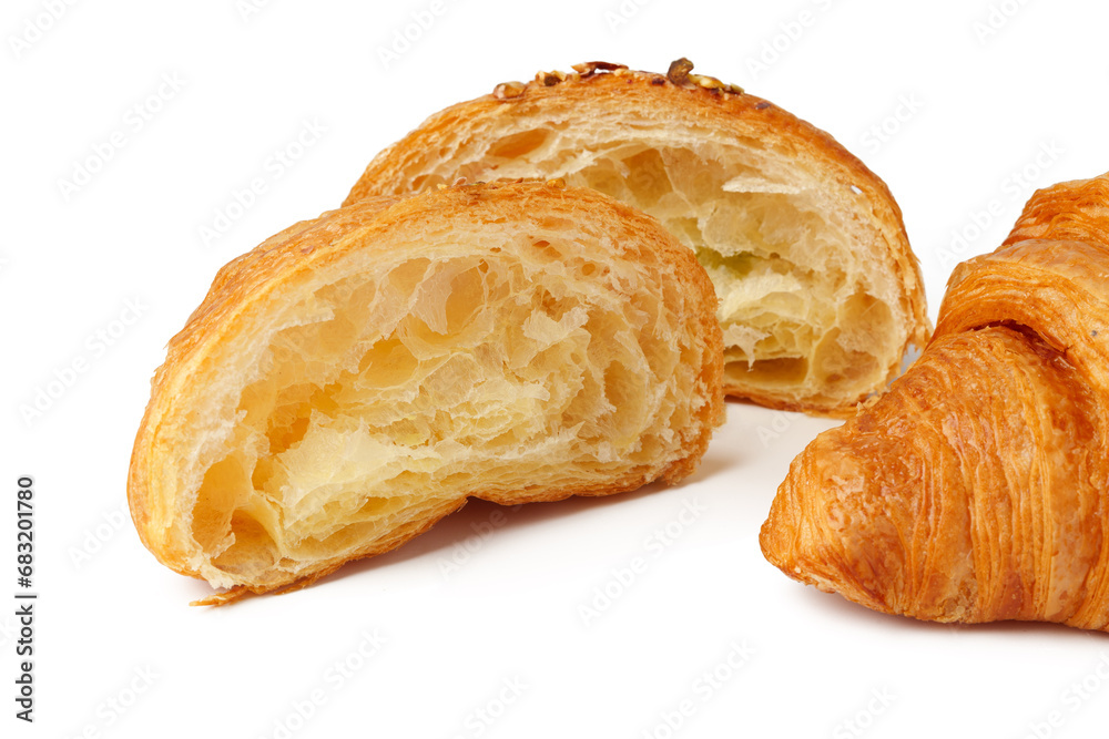 Croissant cut in half isolated on white background Croissant cut in half isolated on white background