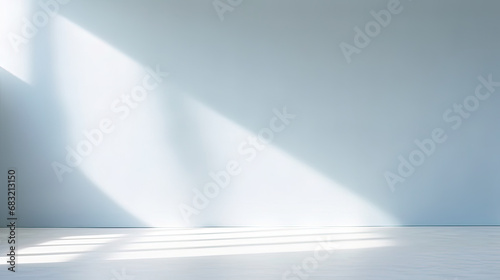 Abstract minimal empty light blue and white 3d room background. Modern Studio showcase with copy space. Mock up scene with natural window shadows, dappled light overlay effect. empty room