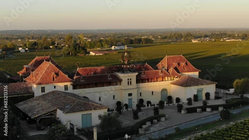 Chateau Angelus winery and vineyard, Saint Emilion in France. Aerial drone panoramic view
