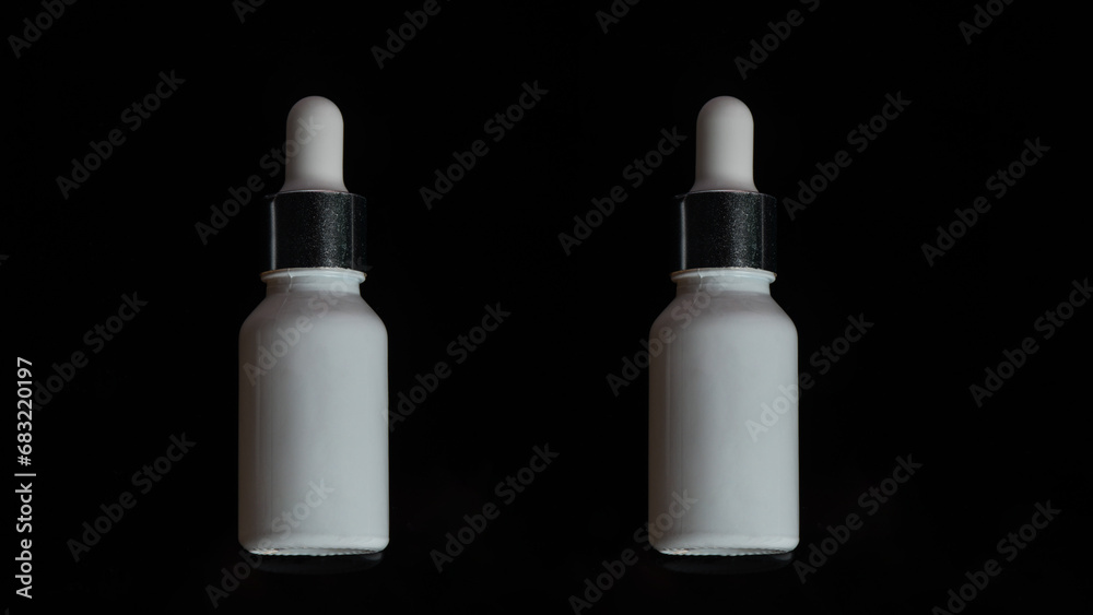 Plastic white tube for cream or lotion. Skin care or sunscreen cosmetic on black background.