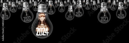 Light Bulbs with New Year 2024 photo