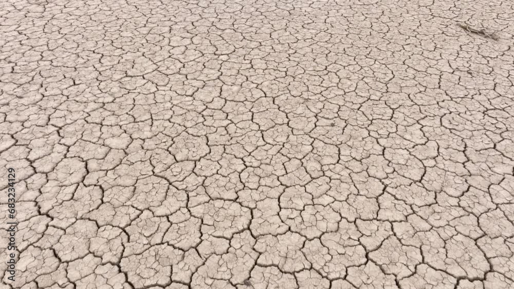 Aerial shot looking down at the cracked surface of a dry lake in Navada Aerial shot looking down at the cracked surface of a dry lake in Navada