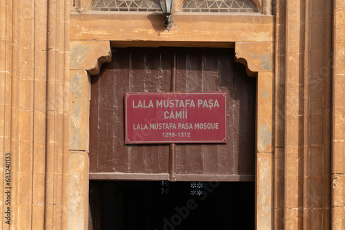 Famagusta (Gazimagusa in Turkish), North Cyprus - October 26, 2023: The door of Lala Mustafa Pasha Mosque is an old Catholic temple whose original name was St. Nicholas Cathedral. photo