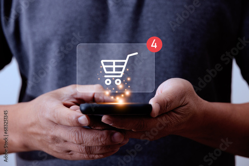 person hand using smartphone for shopping online, buy in online shop by mobile smart phone app, with shopping cart icon, sale volume increase make business growth and shopping online concept.