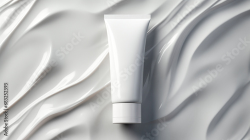 White plastic tube of moisturizer on white background. Flat lay, top view, copy space. photo