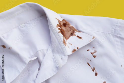 Fototapeta Naklejka Na Ścianę i Meble -  Dirty choclate stain on white shirt