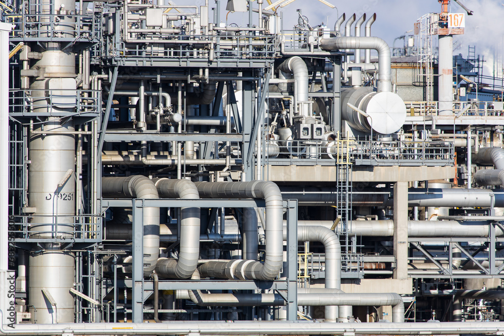 Part of refinery facility with complicated pipe system