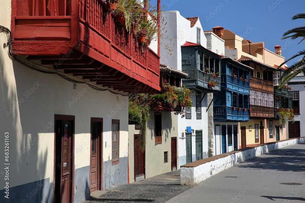 Traditional and colorful houses with wooden balconies located along Maritima avenue in Santa Cruz de la Palma, La Palma, Canary Islands, Spain