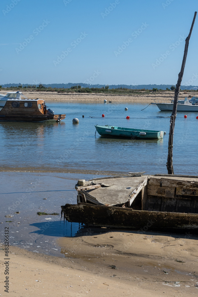 View on Arcachon Bay with many fisherman's boats and oysters farms near Le Phare du Cap Ferret, Cap Ferret peninsula, France, southwest of Bordeaux, France's Atlantic coastline