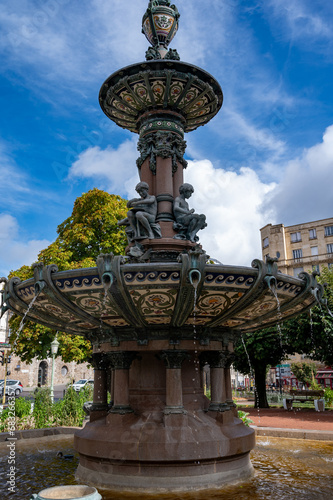 Views of streets and houses of Limoges town, Haute-Vienne department, France with famous porcelain and leather industry, city hall fountain