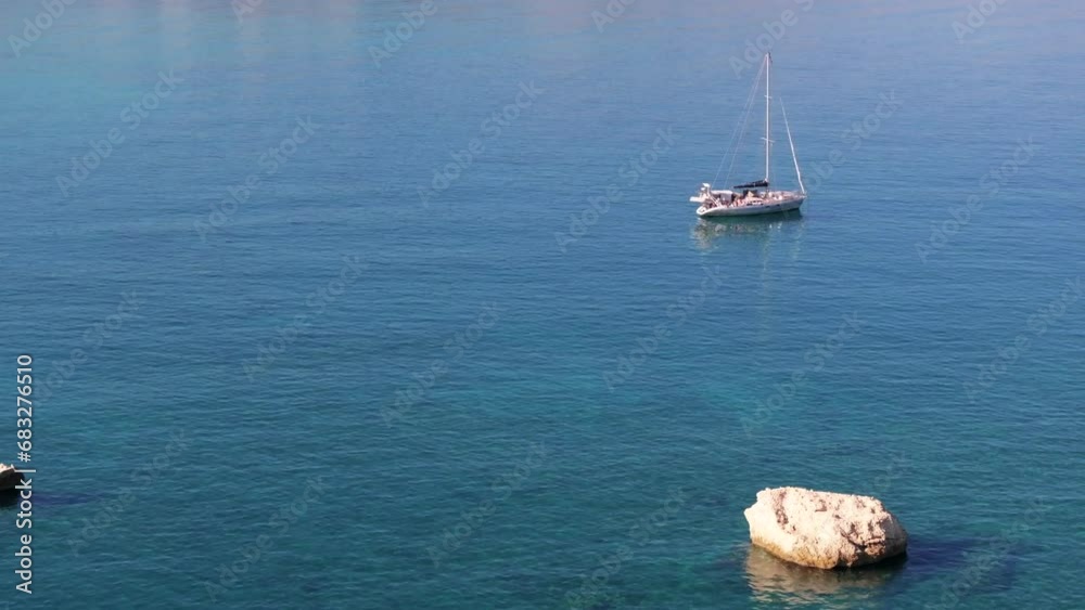 Aerial view of beautiful yacht. Boat on the sea at sunset in summer. island, Greece. Top view of luxury yachts, sailboats, clear blue water, sky, mountain. Travel. Cruise vacation, blue sea lagoon Aerial view of beautiful yacht. Boat on the sea at sunset in summer. island, Greece. Top view of luxury yachts, sailboats, clear blue water, sky, mountain. Travel. Cruise vacation, blue sea lagoon