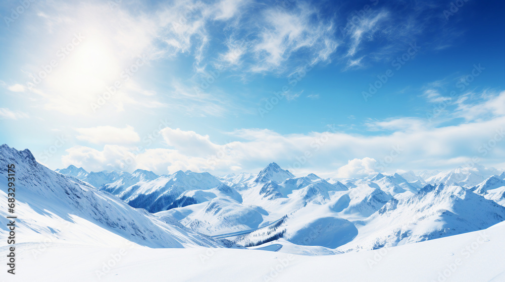 snowy mountains landscape in bright sunlight