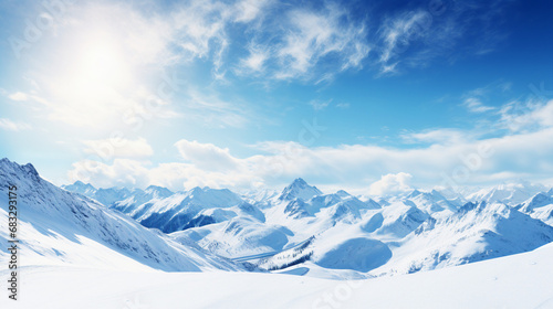 snowy mountains landscape in bright sunlight