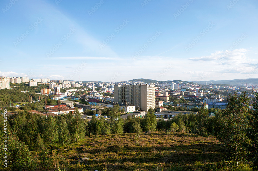 A picturesque view of the city from the observation deck on the southern shore of Semenovskoye Lake. Murmansk. Russia