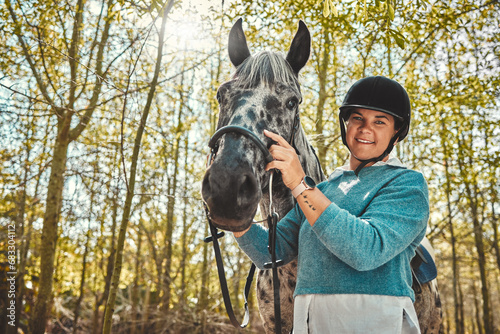 Portrait of woman with horse in woods, smile and pride for competition, race or dressage with trees. Equestrian sport, face of jockey or rider with animal in forest for adventure, training and care.