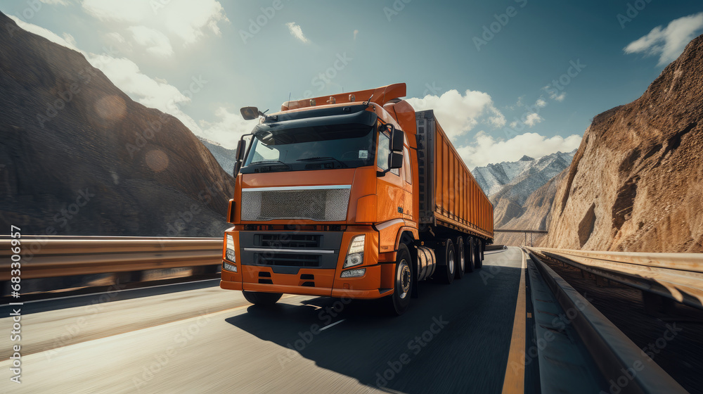 A orange truck moving at a slow speed on the bridge minerals industry.