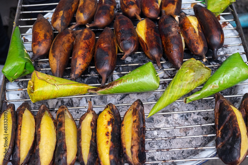 Toasted Bananas and Coconut Sticky Rice Wrapped with Banana Leaf on the Grill
