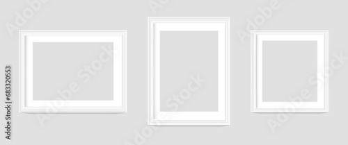 Set of three frames photo picture frames on wall, vector white mockups or empty posters. Empty photo frames mockups for pictures or photograph, realistic 3D blank templates