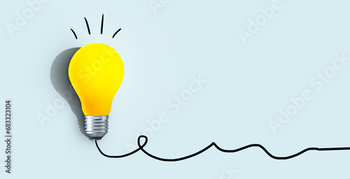 Creative yellow light bulb with shadow burns on a blue background, concept. Think differently, creative idea. Light came on. Brainstorm and thinking. Education and training. Free copy space. Success