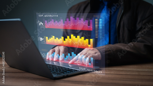 A savvy businessman delves into the depths of financial data, wielding his laptop as a tool to decipher the intricacies of the digital market. information, digital, graph, chart