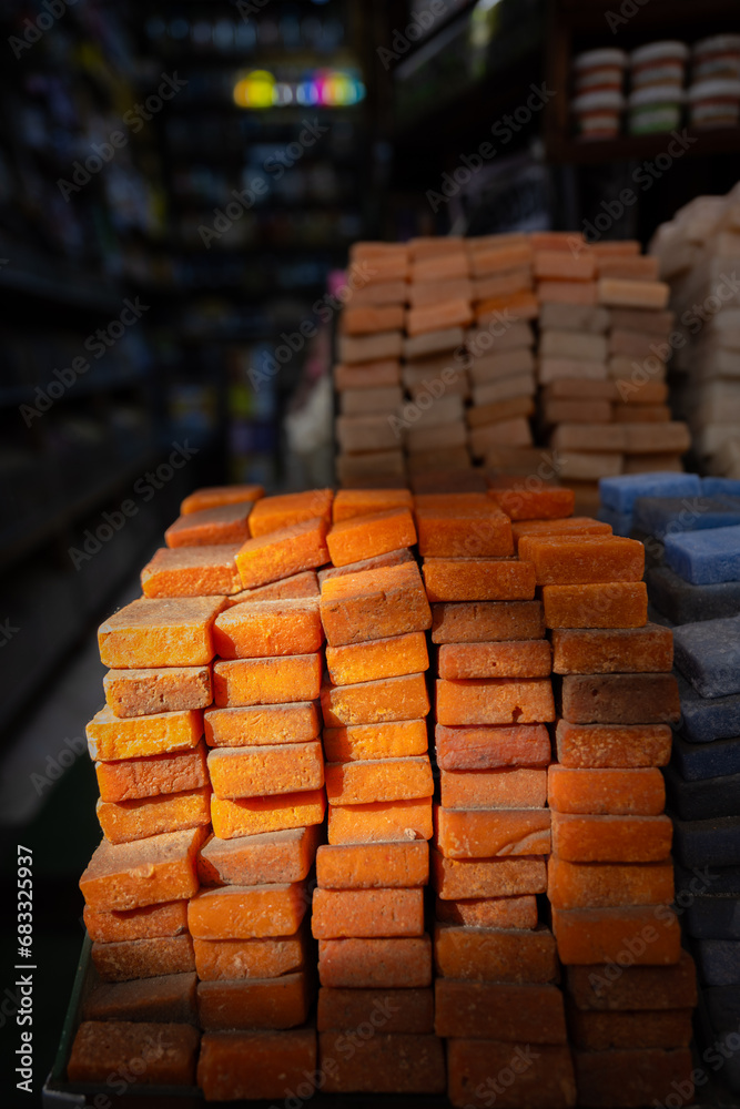 Stunning view of a pile of solid perfumes in Marrakesh's souk, Morocco. Colorful handmade solid perfume tablets.