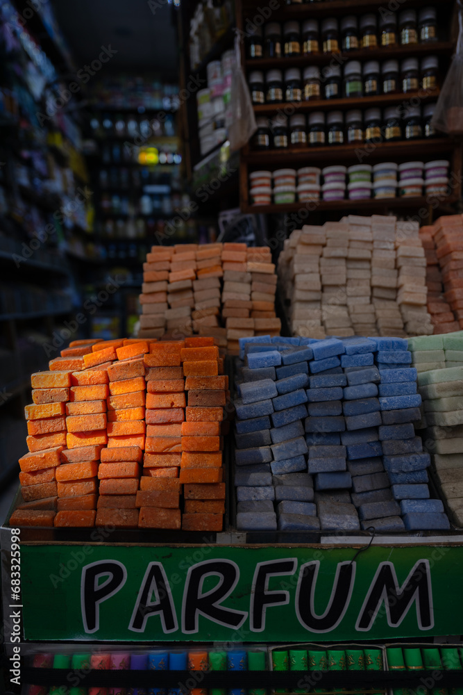 Stunning view of a pile of solid perfumes in Marrakesh's souk, Morocco. Colorful handmade solid perfume tablets.