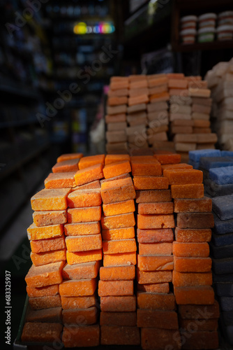 Obraz na płótnie Stunning view of a pile of solid perfumes in Marrakesh's souk, Morocco. Colorful handmade solid perfume tablets. w salonie