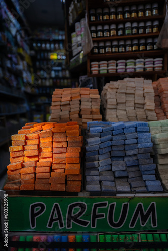 Obraz na płótnie Stunning view of a pile of solid perfumes in Marrakesh's souk, Morocco. Colorful handmade solid perfume tablets. w salonie