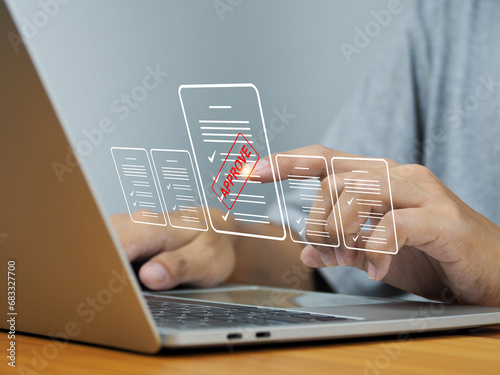 Stamp approval on electronic documents online document management Certification approves company projects on digital documents virtual screens