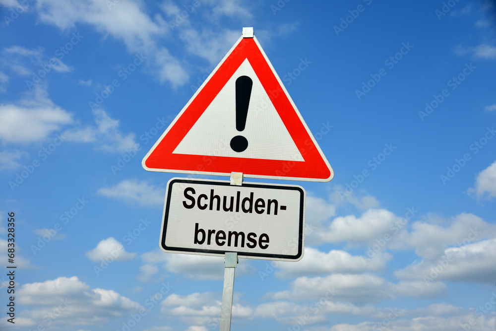 Hamburg, Germany - November 22, 2023: Traffic warning sign saying Debt brake (in German Schuldenbremse)