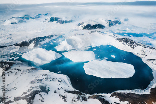 Fényképezés The image shows a stunning aerial view of Jokulsarlon glacier lagoon in Iceland, with icebergs floating in the crystal-clear water