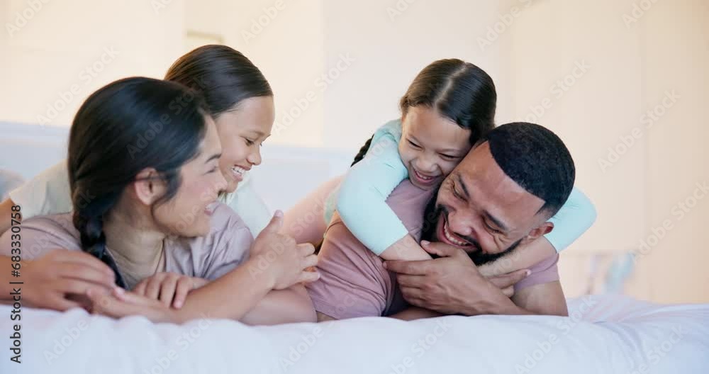 Happy family, parents and children on bed with hug, playing and bonding fun in home on weekend. Mother, father and kids in playful embrace in bedroom, quality time together and laughing with love. Happy family, parents and children on bed with hug, playing and bonding fun in home on weekend. Mother, father and kids in playful embrace in bedroom, quality time together and laughing with love.