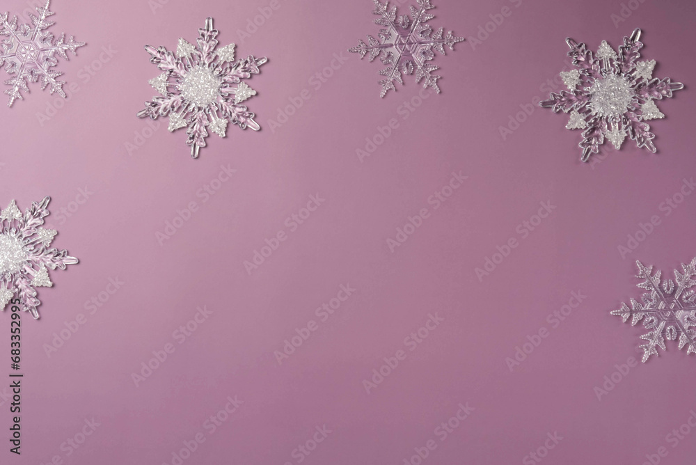 Snowflakes on a purple background and space for text Snowflakes on a purple background and space for text