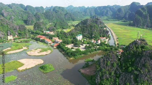 Wallpaper Mural Rural village, drone and mountains in countryside, travel and trip to Vietnam, outdoors and destination. Aerial, landscape and vacation to wilderness, holiday and getaway in nature, town and lake Torontodigital.ca