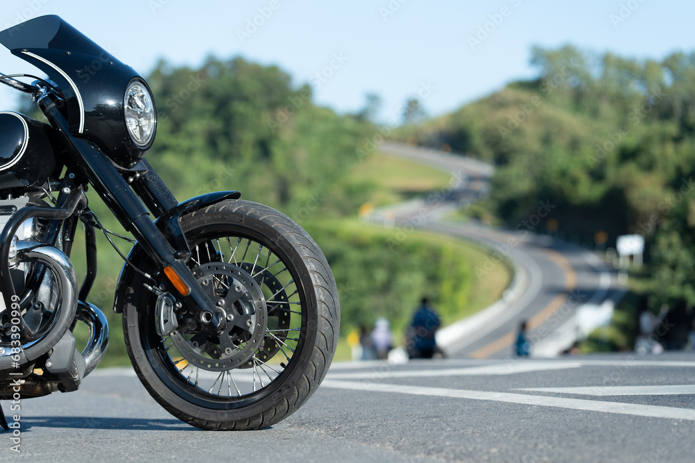 motorcycle in a sunny motorbike on the road riding.with sunset light. copyspace for your individual text. classic motorcycle.	